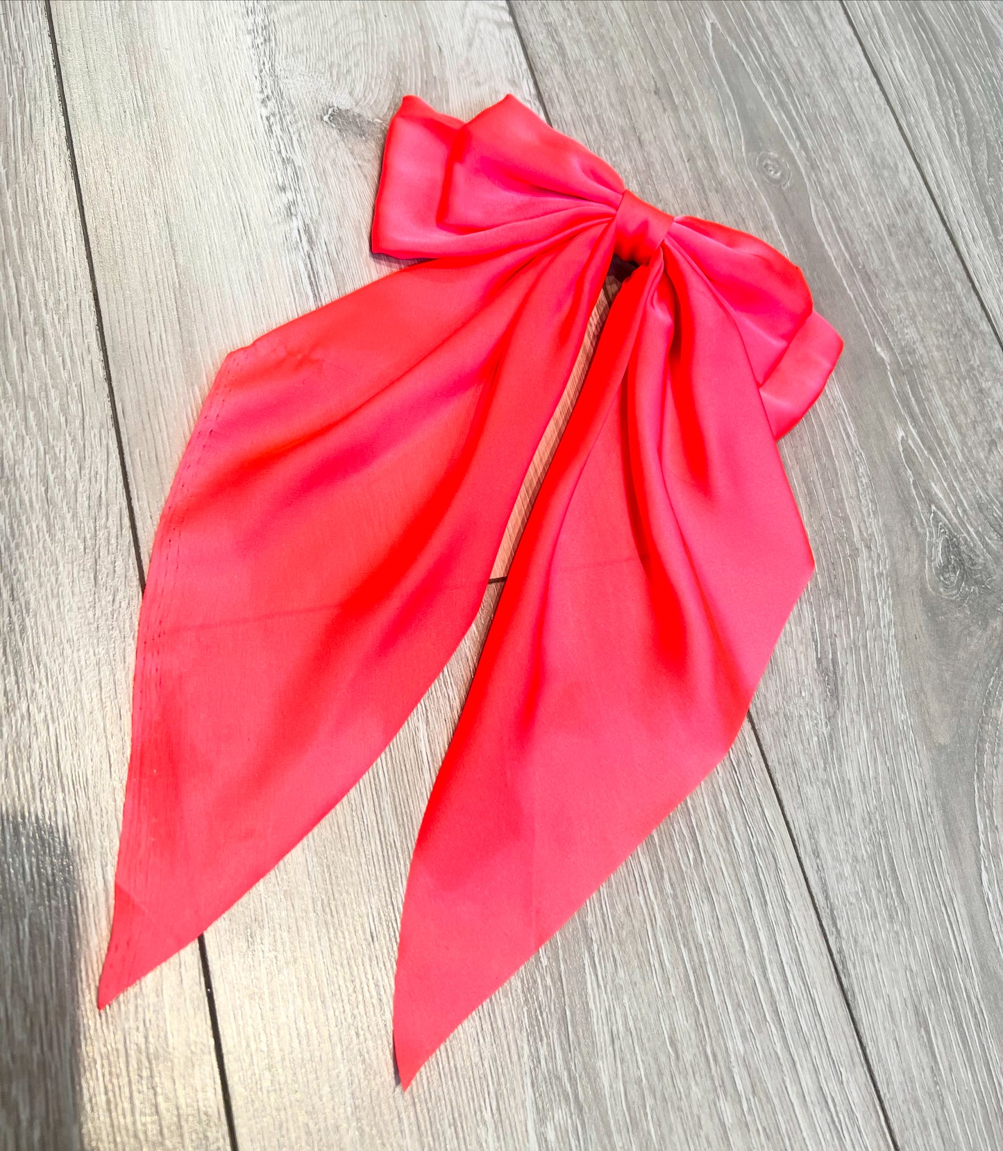 Neon pink hair bow
